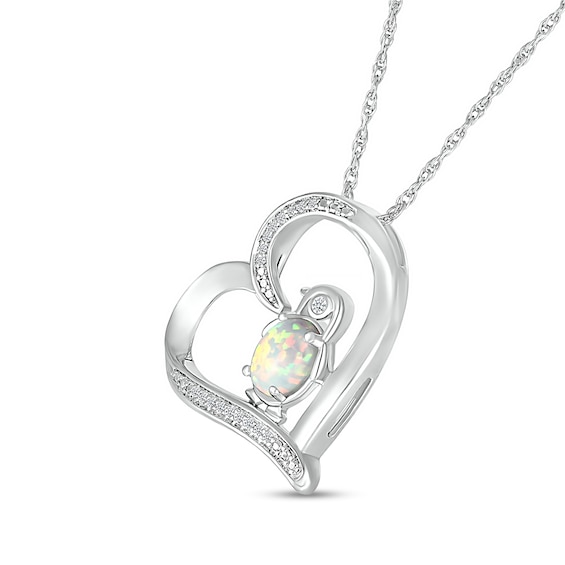 Oval Lab-Created Opal and 1/20 CT. T.w. Diamond Penguin in Tilted Heart Outline Pendant in Sterling Silver
