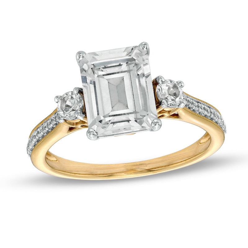 Main Image 1 of Emerald-Cut White Lab-Created Sapphire and 1/10 CT. T.W. Diamond Three Stone Engagement Ring in 14K Gold Over Silver