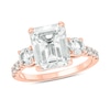 Thumbnail Image 1 of Emerald-Cut and Round White Lab-Created Sapphire and 1/5 CT. T.W. Diamond Three Stone Ring in 10K Rose Gold