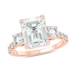 Emerald-Cut and Round White Lab-Created Sapphire and 1/5 CT. T.W. Diamond Three Stone Ring in 10K Rose Gold