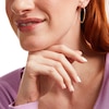 Thumbnail Image 1 of 35.0mm Diamond-Cut Tube Hoop Earrings in 14K Gold