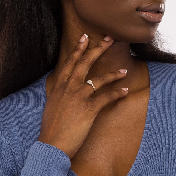 Cherished Promise Collectionâ¢ 1/4 CT. T.w. Princess-Cut Diamond Frame Twist Shank Promise Ring in 10K Gold