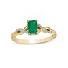 Thumbnail Image 0 of Emerald-Cut Emerald and 1/20 CT. T.W. Diamond Twist Shank Ring in 14K Gold