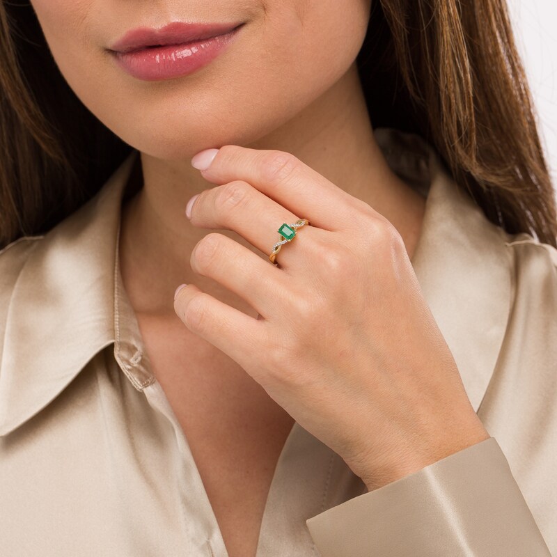 Main Image 2 of Emerald-Cut Emerald and 1/20 CT. T.W. Diamond Twist Shank Ring in 14K Gold