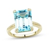 Thumbnail Image 0 of Emerald-Cut Faceted Sky Blue Topaz and 1/10 CT. T.W. Diamond Four-Corner Overlay Accent Ring in 10K Gold - Size 7