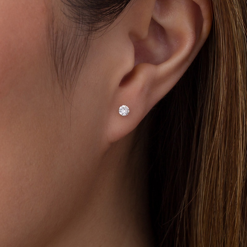 Main Image 2 of 1/5 CT. T.W. Diamond Solitaire Stud Earrings in 10K White Gold (J/I3)