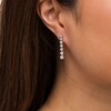 Thumbnail Image 3 of Marilyn Monroe™ Collection 1/2 CT. T.W. Diamond Graduated Drop Earrings in 10K White Gold