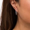 Thumbnail Image 3 of Marilyn Monroe™ Collection 1/2 CT. T.W. Baguette Diamond Hoop Earrings in 10K White Gold