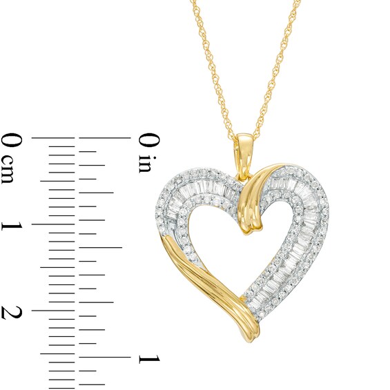1/2 CT. T.w. Diamond Triple Row Heart Pendant in 10K Gold