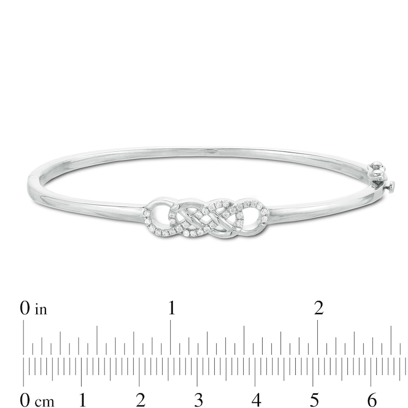 1/5 CT. T.W. Diamond Infinity Knot Bangle in Sterling Silver | Zales