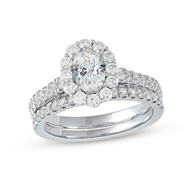 Main Image 1 of 1-3/4 CT. T.W. Oval Diamond Scallop Frame Bridal Set in Platinum (I/SI2)