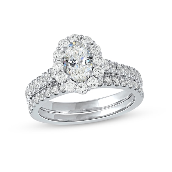 1-3/4 CT. T.w. Oval Diamond Scallop Frame Bridal Set in Platinum (I/Si2)