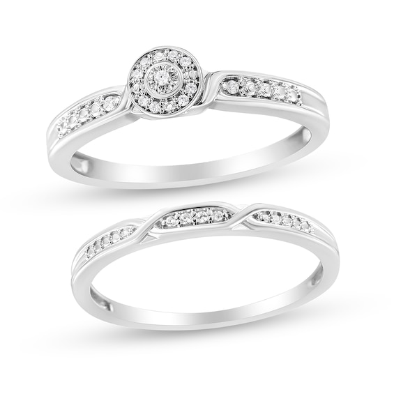 1/20 CT. T.w. Diamond Frame Twist Shank Bridal Set in Sterling Silver