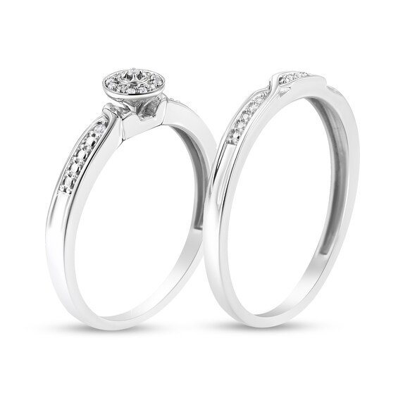 1/20 CT. T.w. Diamond Frame Twist Shank Bridal Set in Sterling Silver