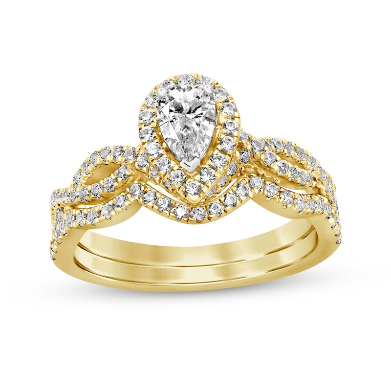 Main Image 1 of 1 CT. T.W. Pear-Shaped Diamond Twist Shank Bridal Set in 14K Gold (I/I2)
