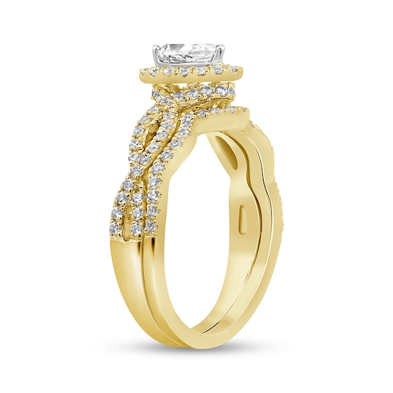1 CT. T.w. Pear-Shaped Diamond Twist Shank Bridal Set in 14K Gold (I/I2)