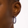 Thumbnail Image 1 of Oval Tanzanite Inside-Out Hoop Earrings in Sterling Silver