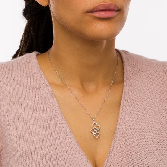 1/3 CT. T.w. Diamond Interlocking Curvy Hearts Pendant in 10K White Gold