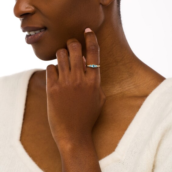 Swiss Blue Topaz and Diamond Accent Three Stone Ring in 10K Gold