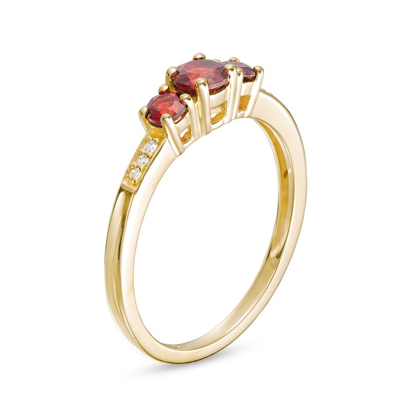 Main Image 3 of Garnet and Diamond Accent Three Stone Ring in 10K Gold