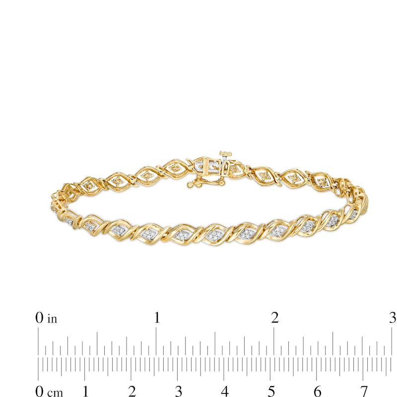 1/5 CT. T.W. Composite Marquise Diamond Cascading Flames Bracelet in 10K Gold - 7.25"