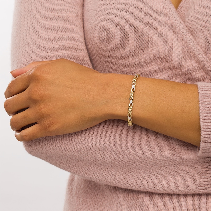 Main Image 2 of 1/4 CT. T.W. Diamond Infinity "X" Bracelet in 10K Gold - 7.5"
