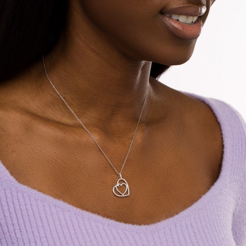 Main Image 2 of 1/4 CT. T.W. Diamond Interlocking Offset Hearts Pendant in 10K White Gold