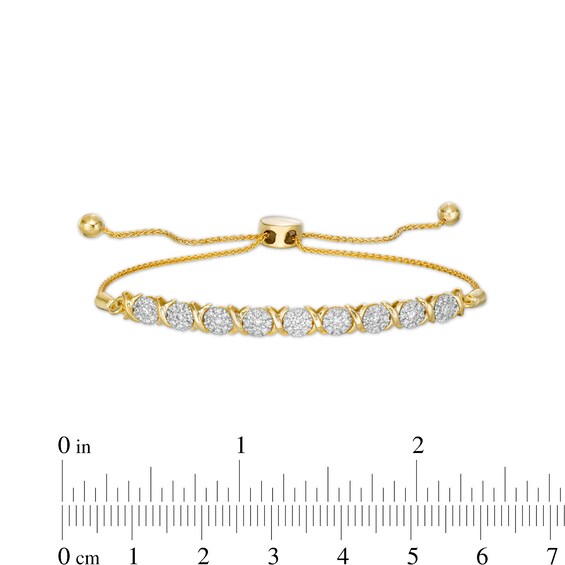 1/2 CT. T.w. Multi-Diamond Nine Stone "X" Bolo Bracelet in 10K Gold - 9.5"