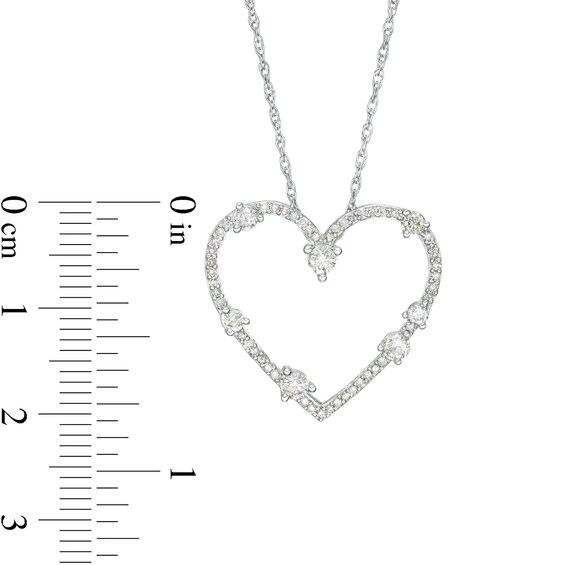 1/2 CT. T.w. Diamond Station Heart Pendant in 10K White Gold