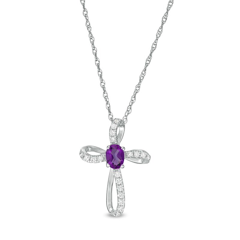 Main Image 1 of Oval Amethyst and 1/10 CT. T.W. Diamond Pinwheel Cross Pendant in 10K White Gold