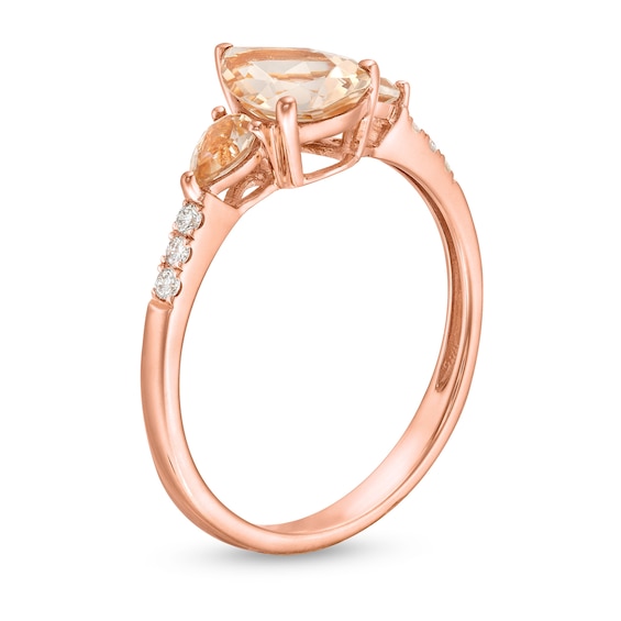 Pear-Shaped Morganite and 1/15 CT. T.w. Diamond Three Stone Ring in 10K Rose Gold