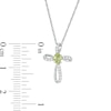 Thumbnail Image 2 of Oval Peridot and 1/10 CT. T.W. Diamond Pinwheel Cross Pendant in 10K White Gold
