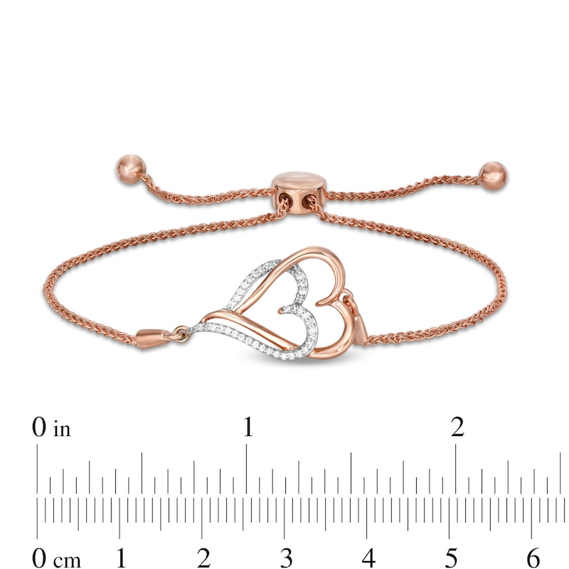 Main Image 3 of 1/10 CT. T.W. Diamond Interlocking Double Elongated Heart Bolo Bracelet in Sterling Silver with 14K Rose Gold Plate