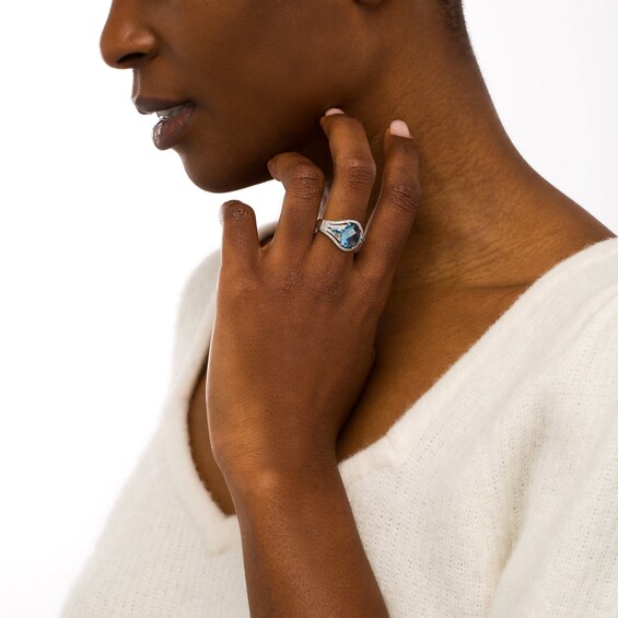 Oval Blue Lab-Created Spinel and White Lab-Created Sapphire Three Stone Dome Ring in Sterling Silver