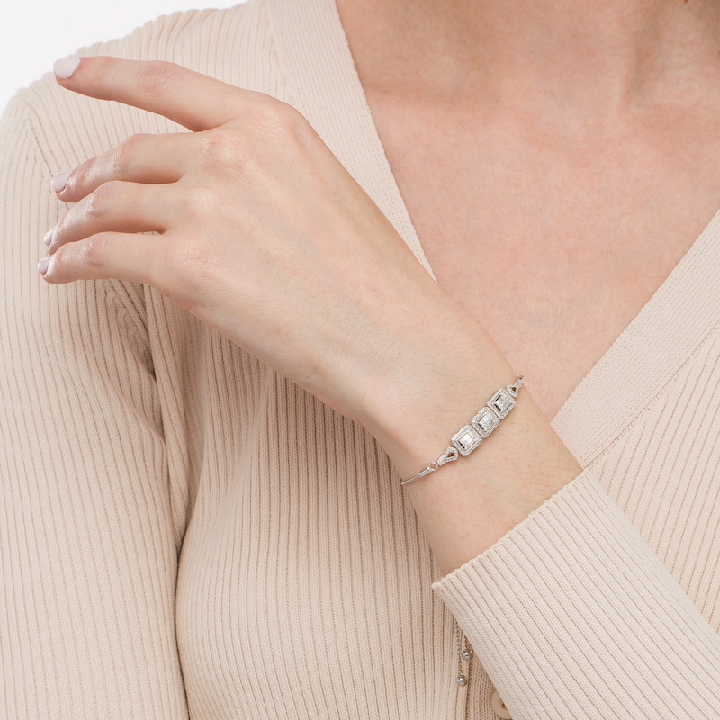 Main Image 3 of Marilyn Monroe™ Collection 5/8 CT. T.W. Emerald-Shaped Diamond Frame Three Stone Bolo Bracelet in 10K White Gold - 9.5"