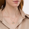 Thumbnail Image 2 of 9.0mm Sky Blue Topaz and 1/10 CT. T.W. Diamond Frame Sunburst Pendant in Sterling Silver with 14K Gold Plate