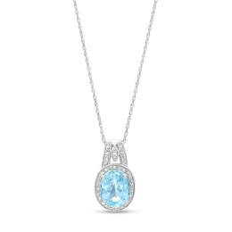 Oval Sky Blue Topaz and Diamond Accent Bead Frame Pendant in Sterling Silver