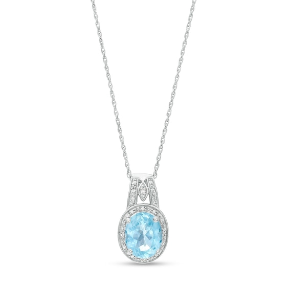 Oval Sky Blue Topaz and Diamond Accent Bead Frame Pendant in Sterling Silver