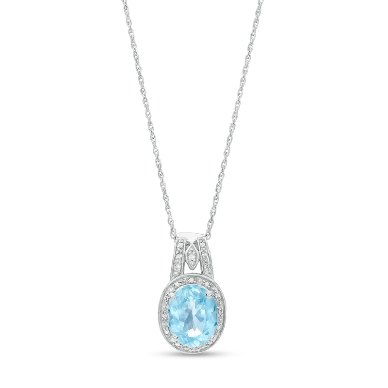 Main Image 1 of Oval Sky Blue Topaz and Diamond Accent Bead Frame Pendant in Sterling Silver