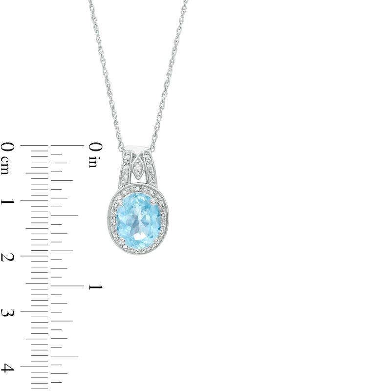 Main Image 3 of Oval Sky Blue Topaz and Diamond Accent Bead Frame Pendant in Sterling Silver