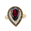 Thumbnail Image 0 of Pear-Shaped Garnet and 1/5 CT. T.W. Red Enhanced and White Diamond Frame Ring in Sterling Silver with 14K Gold Plate