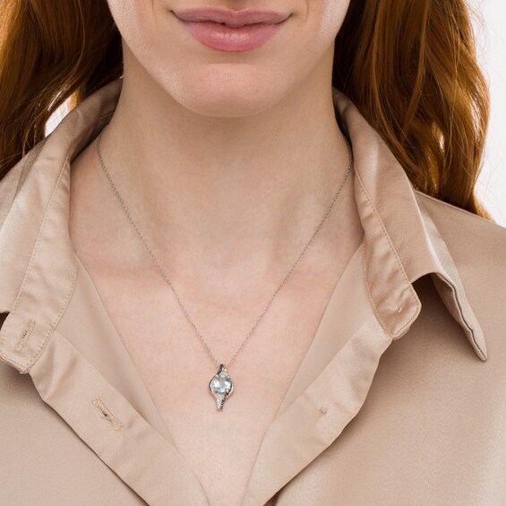 Oval Sky Blue Topaz with Blue Enhanced and White Diamond Bead Flame Pendant in Sterling Silver and Blue Rhodium