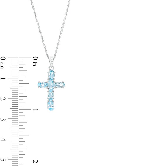 Oval Sky Blue Topaz Cross Pendant in Sterling Silver