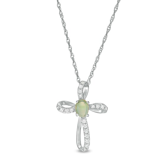 Oval Opal and 1/10 CT. T.w. Diamond Pinwheel Cross Pendant in 10K White Gold