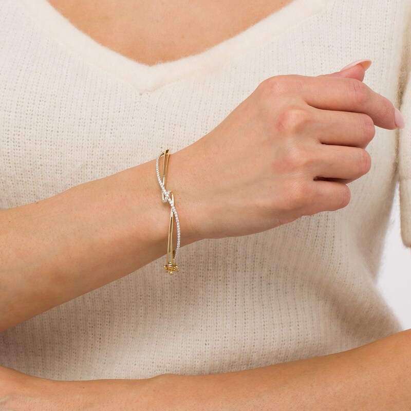 Main Image 2 of 1/2 CT. T.W. Diamond Twist Knot Bangle in 10K Gold