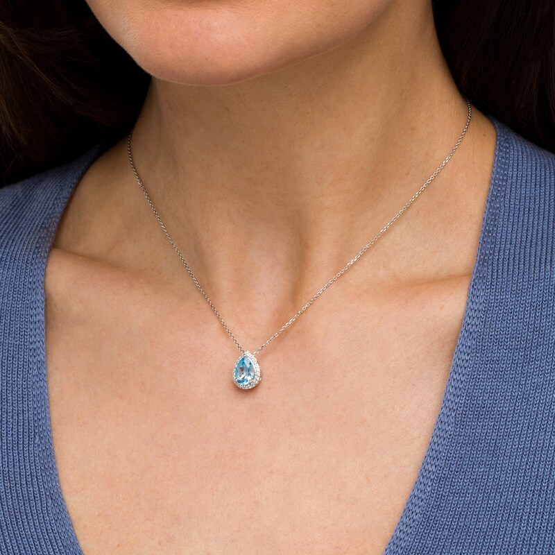 Main Image 2 of Pear-Shaped Swiss Blue Topaz and White Lab-Created Sapphire Frame Pendant in Sterling Silver