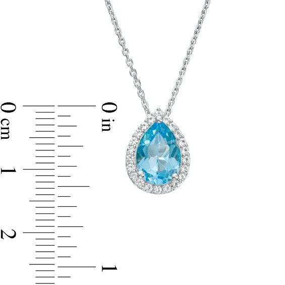 Pear-Shaped Swiss Blue Topaz and White Lab-Created Sapphire Frame Pendant in Sterling Silver