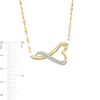 Thumbnail Image 4 of 1/6 CT. T.W. Diamond Sideways Twisted Heart Necklace in 10K Gold