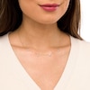 Thumbnail Image 2 of 1/8 CT. T.W. Diamond "XOXO" Station Necklace in 10K Gold – 17.5"