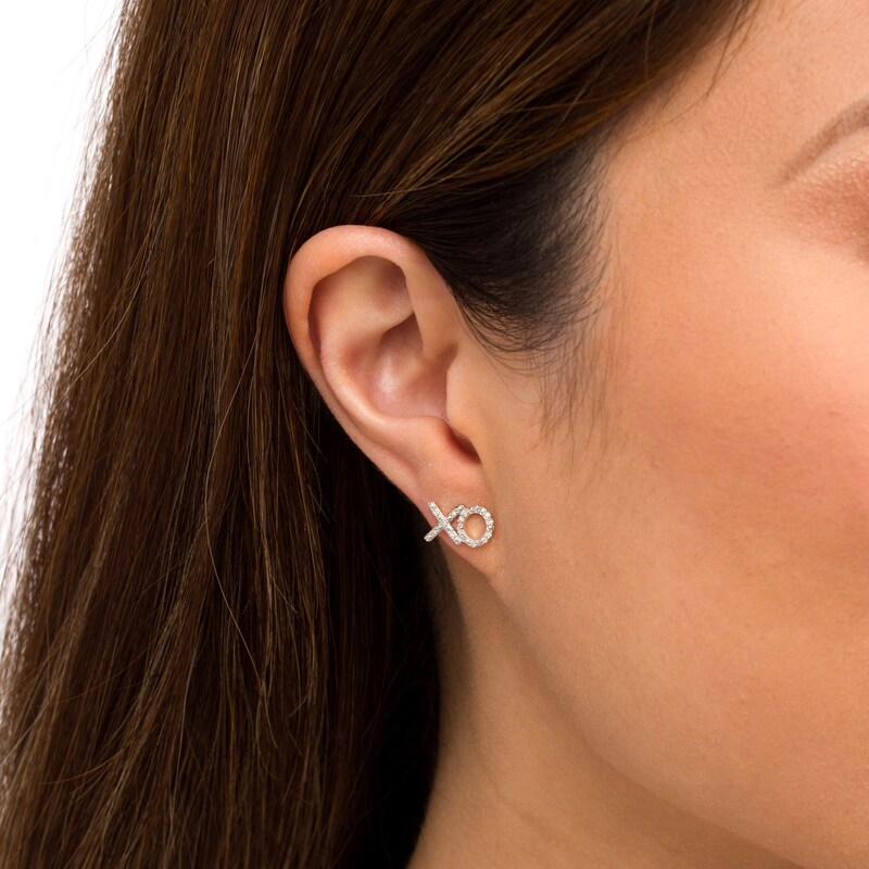 Main Image 2 of 1/8 CT. T.W. Diamond "XO" Stud Earrings in 10K Gold